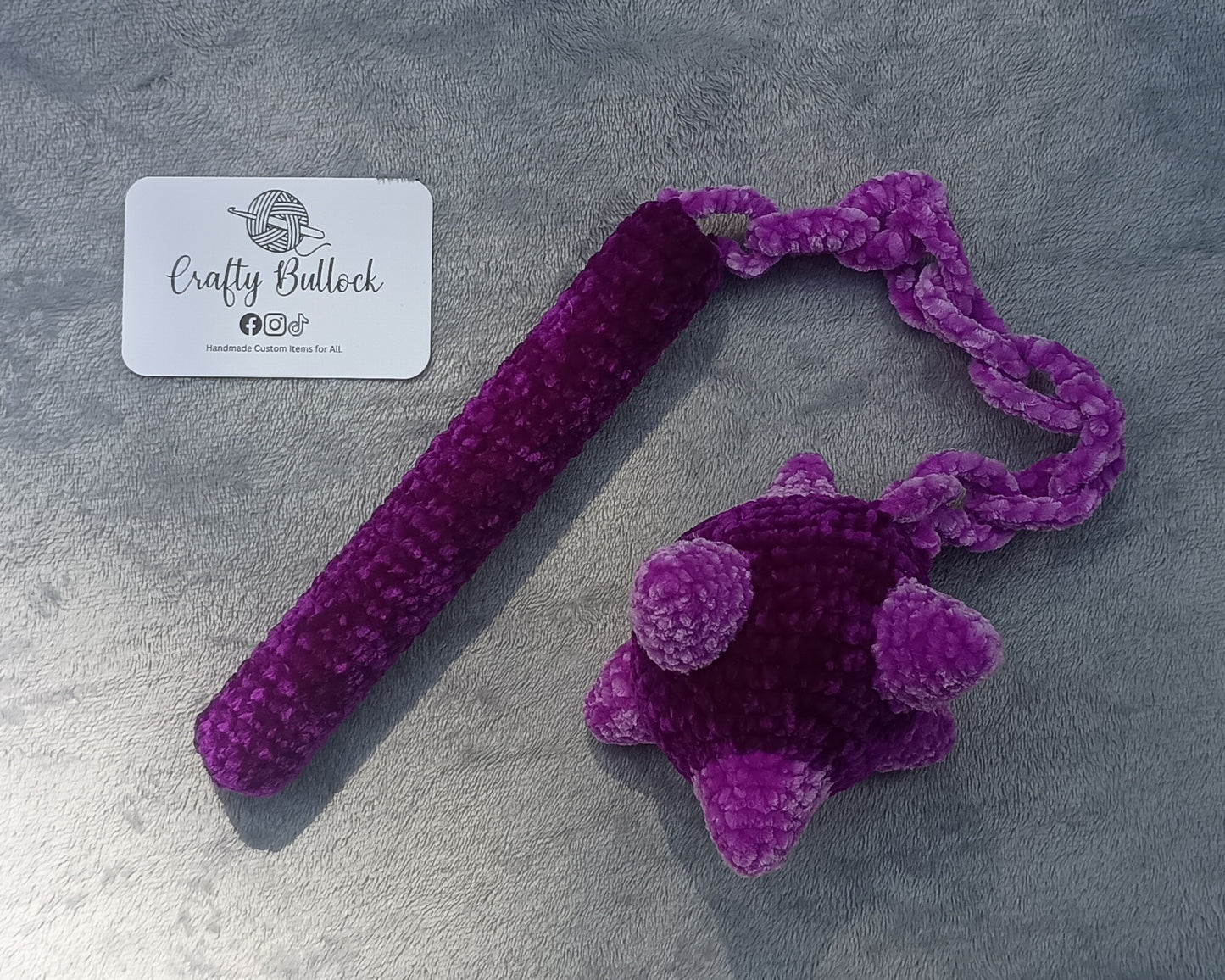 Purple medieval style plush weapon