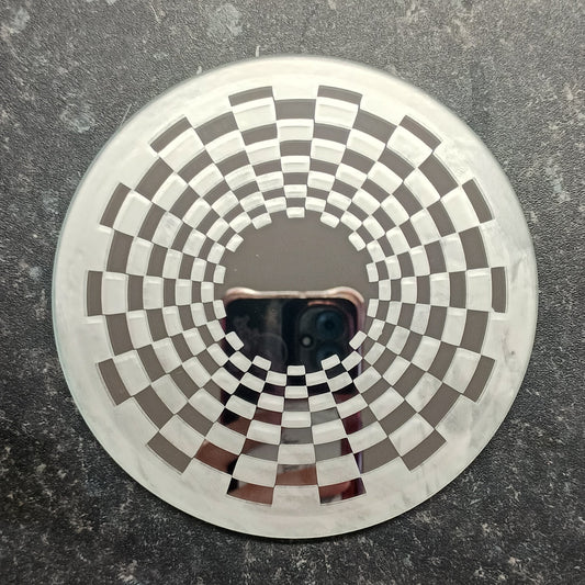 Etched optical illusion mirror