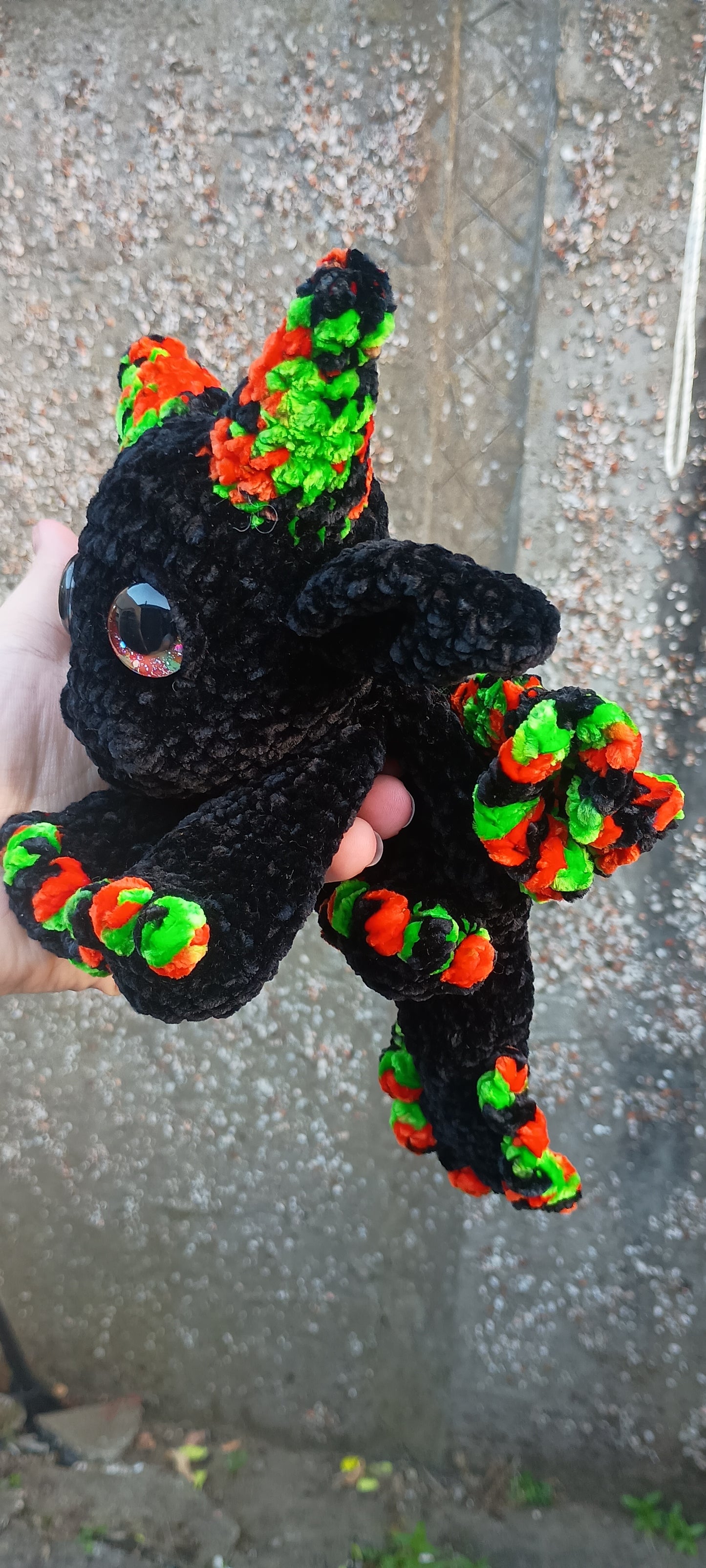 Black green and orange spooky dragon snuggler